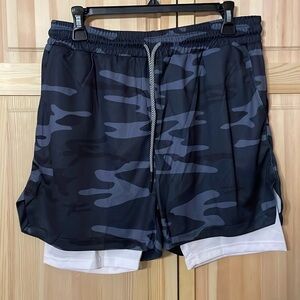 T8. Men’s small or boys XXL shorts.